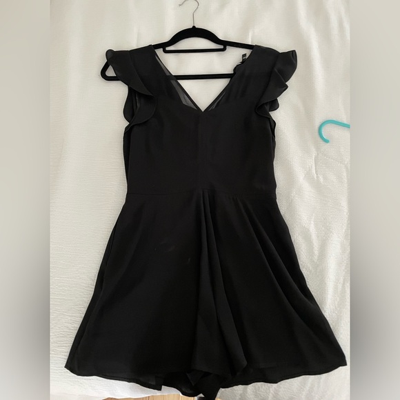 Express Dresses & Skirts - Black Ruffle Sleeve Romper